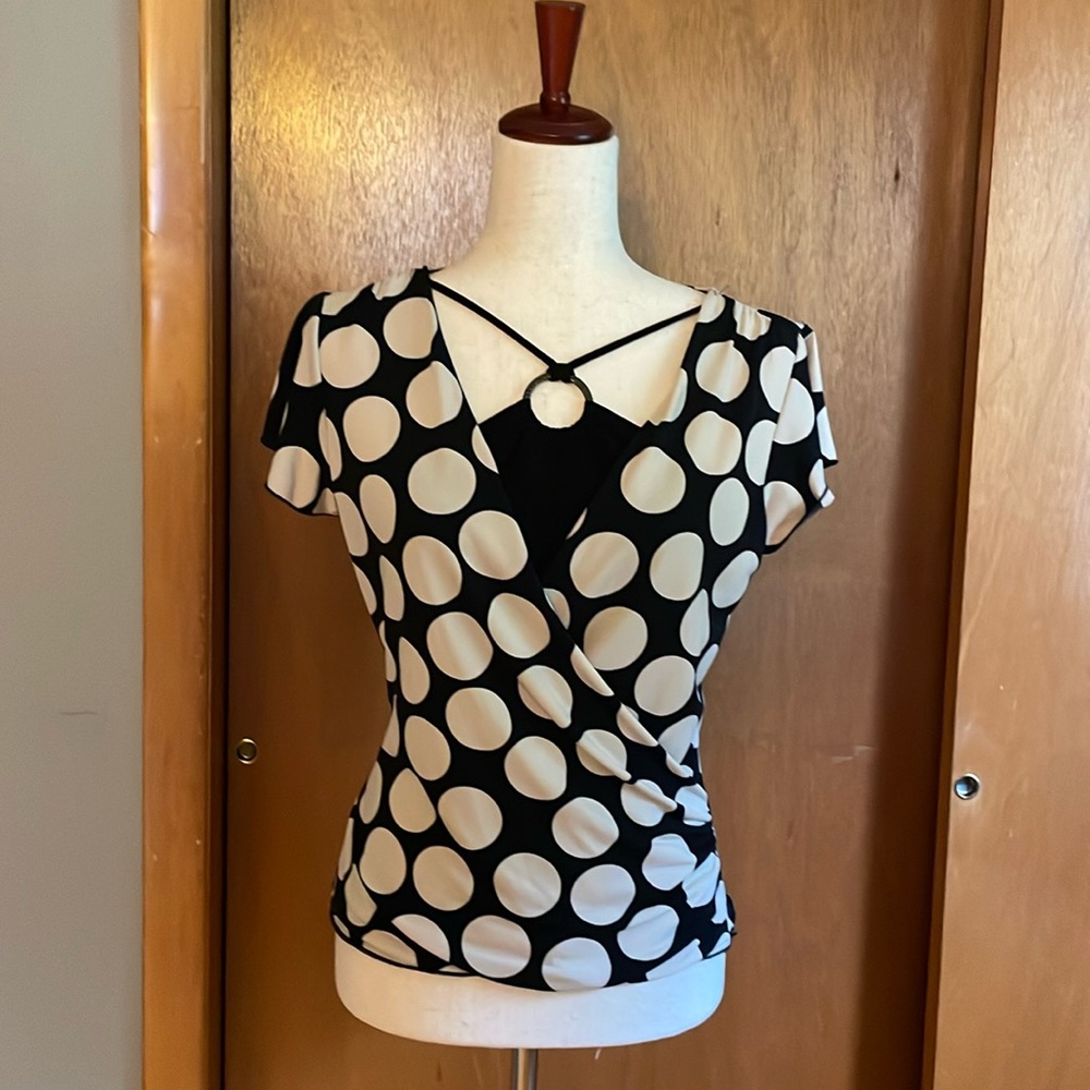 IZ  Byer blouse  size L. Polka dots, stretchy, short sleeves. Black and cream